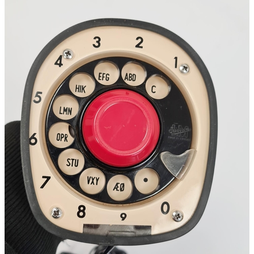 250 - Ericsson LM retro red telephone with turn dial to base, 21cm high