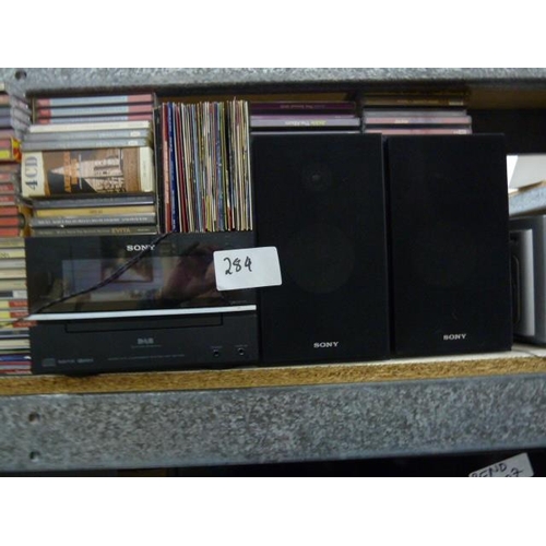 284 - 2 x Sony music systems, a Philips music system, a quantity of CDs and a digital CD compact disc play... 