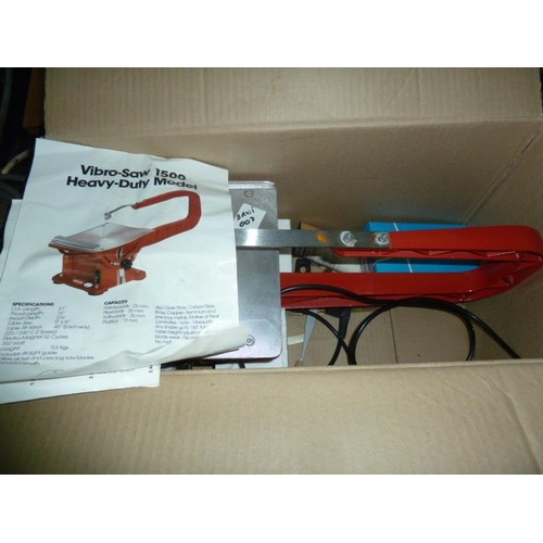 359 - Boxed table jigsaw, two saw horses, a carpenter's toolbox and an electric glue pot