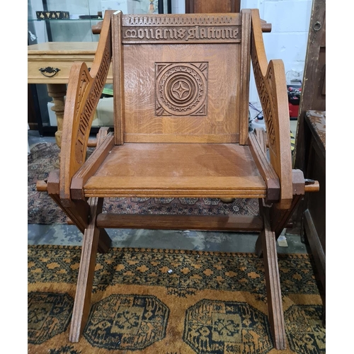 1355 - Reproduction oak Glastonbury type chair with carved decoration