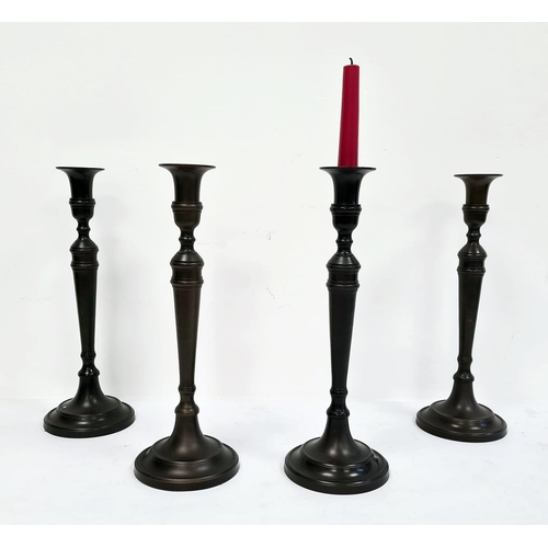 157 - Set of four bronze-effect table candlesticks (4)