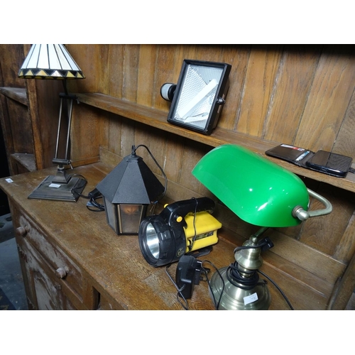 243 - Various reproduction 1920's lamps including one with a Tiffany-style lamp, a green glass desk lamp a... 