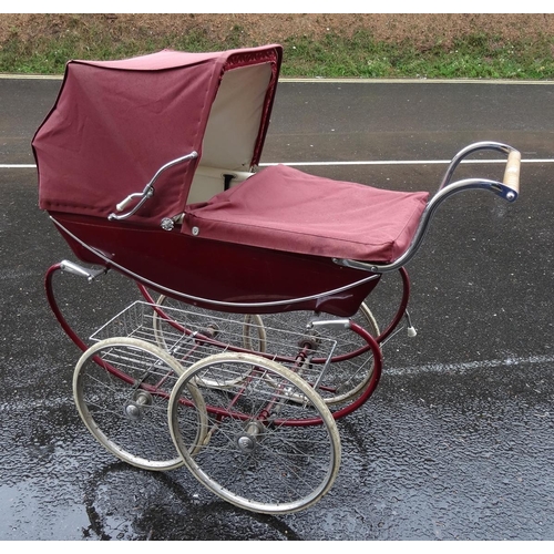 303A - Silver Cross pram with maroon fittings, a tray beneath the pram, double wheels and swan fitting  and... 