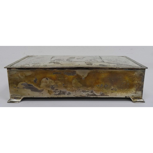 488 - 1930's silver-mounted rectangular box with clover and scroll relief decoration to lid edge, with eng... 