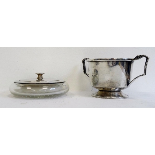 527 - 1930's silver two-handled trophy cup of squat form, on circular base, Birmingham 1934, makers E.W.H,... 