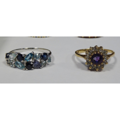 549 - 9ct gold, diamond and amethyst-coloured circular cluster ring, a white metal dress ring set multiple... 