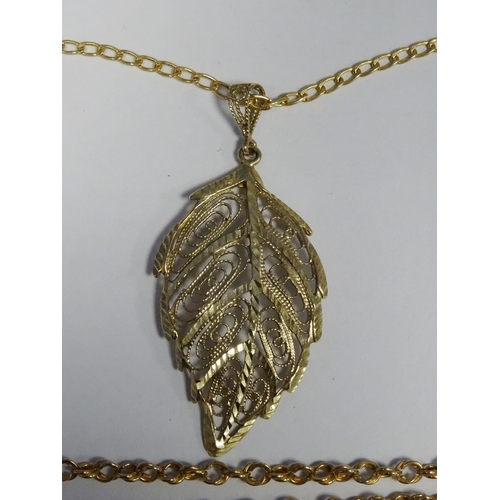 576 - 9ct gold leaf pendant on 9ct gold chain, 4.9g approx, a 9ct gold chain necklace, 0.9g approx, a 9ct ... 