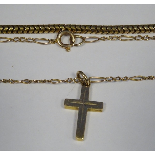 606 - 9ct gold chain link necklace, 10.6g approx and a 9ct gold crucifix on chain .5g (2)