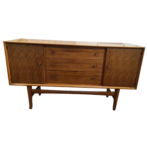 1363 - Gordon Russell Afromosia teak sideboard, three central drawers, flanked by cupboard doors