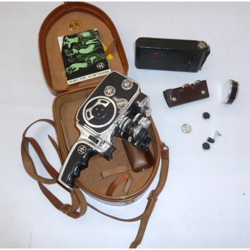 153 - A Kodak folding camera and a Bolex D8LA camera with instruction manual and fitted case