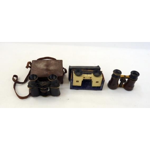 164 - A pair of 20th Century Solus binoculars, no. 389, in fitted case and two other pairs of binoculars (... 