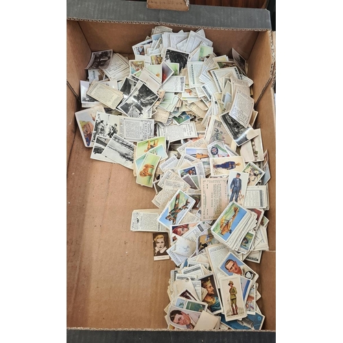 185 - A quantity of loose cigarette cards, a cigar box of cigarette cards, a tin of cards, Churchman, Play... 