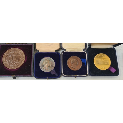 243 - Large collection of bronze and white metal commemorative medals (2 boxes)