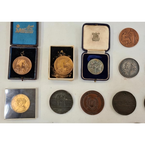 243 - Large collection of bronze and white metal commemorative medals (2 boxes)