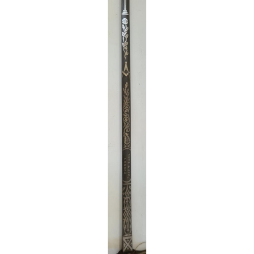 262 - LOT WITHDRAWN  Toye & Co London masonic sword with brass and leather handle and scabbard, another ma... 