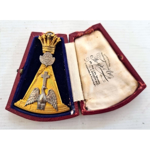 265 - A gold coloured masonic medal, in the shape of a drawing compass, crown finial, one side with enamel... 