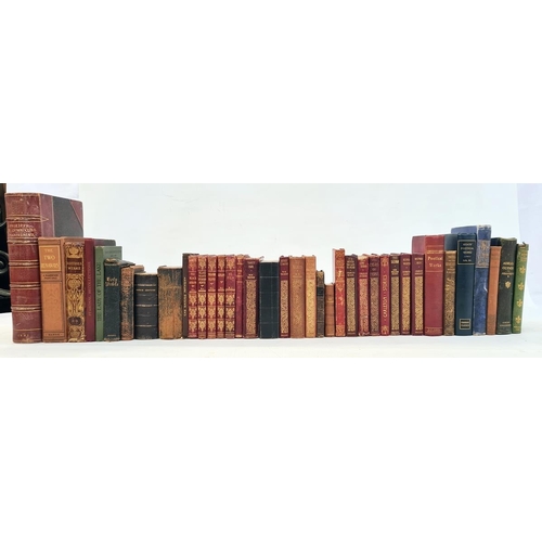 34 - Various volumes to include Walter Scott, George Elliot, Goethe, a New Testament with carved olive bo... 