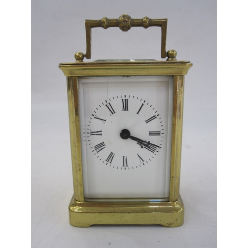 298 - A French carriage clock, Roman numeral enamel dial, 10.5cm high not including handle