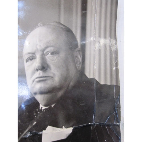 144 - A Cecil Beaton photograph of Winston Churchill, unframed, Stamped to reverse and a photograph of Eis... 