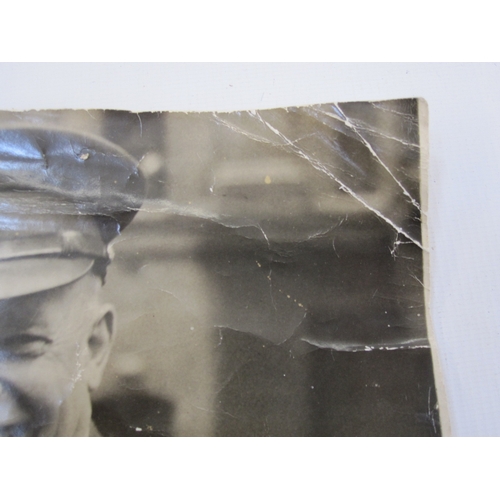 144 - A Cecil Beaton photograph of Winston Churchill, unframed, Stamped to reverse and a photograph of Eis... 