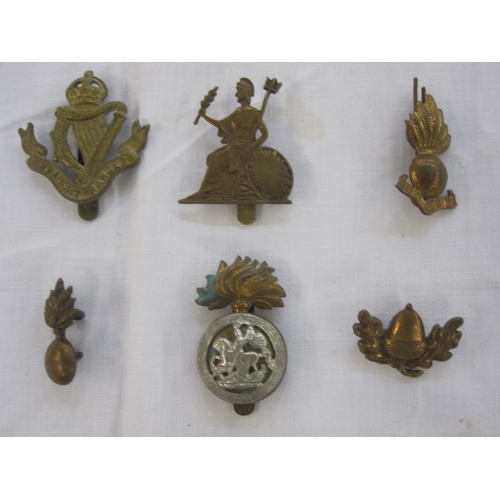 238 - Collection of British military cap badges, badges and buttons (1 bag)