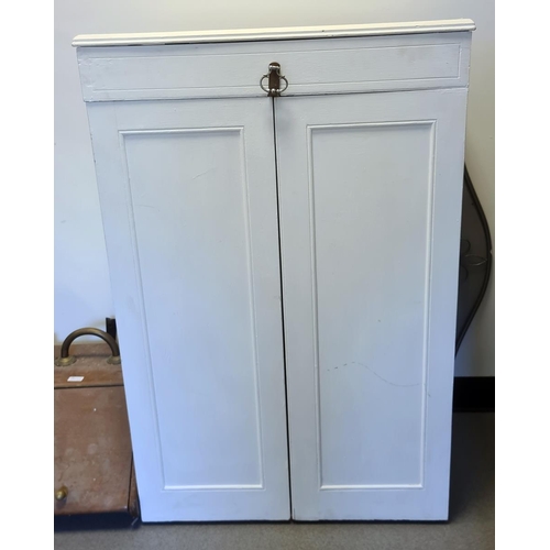 1057 - White painted two-door wardrobe, the hinged mechanism doors opening to reveal integral hanging space... 