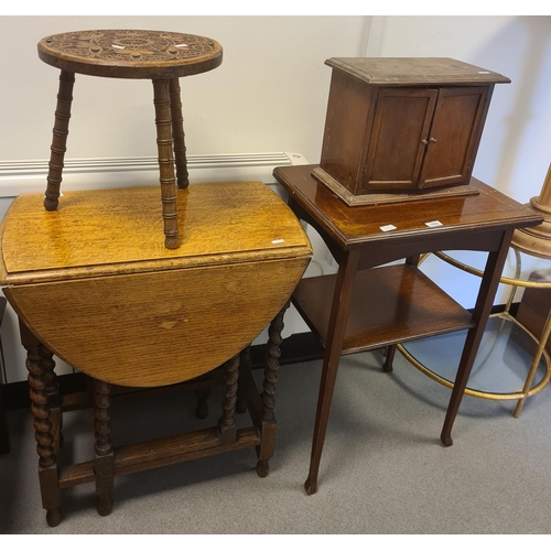 1059 - Oak gateleg table, a small table-top stationery desk tidy, a two-tier table and a stool (4)