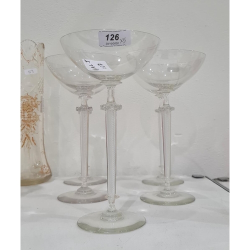 126 - Five modern stemmed saucer champagnes with frilled knop and tapering multiple air twist stem