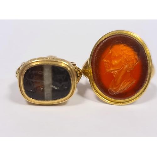 236 - Georgian gold gentleman's seal ring inset oval cornelian intaglio carved with portrait bust of a gen... 