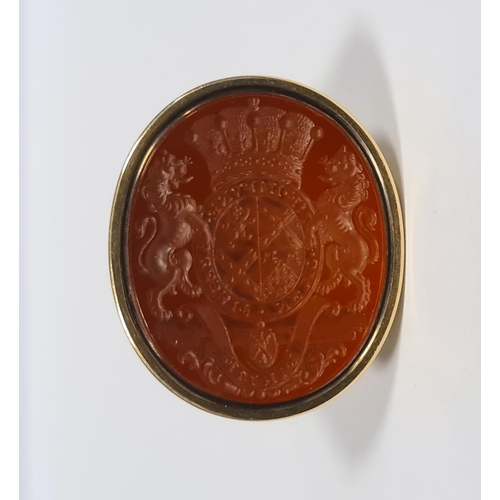 314 - Georgian gold fob seal inset oval intaglio carved cornelian and on C-scroll mounts

Provenance:

By ... 