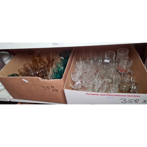 358 - Four boxes of assorted glassware including blue glass tumblers, vintage smoked wine glasses, sundae ... 