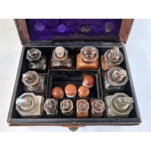 234 - A 19th century leather cased medicine box, with fitted compartments, glass medicine bottle, four wit... 