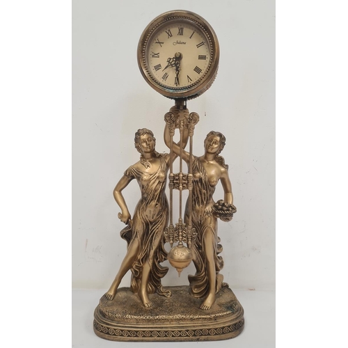 1003 - Mantel clock in the French manner, quart movement by Juliana, in the form of two female figures hold... 