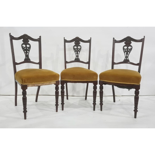 1093 - Two armchairs and three late Victorian dining chairs upholstered in mustard yellow fabric (5)