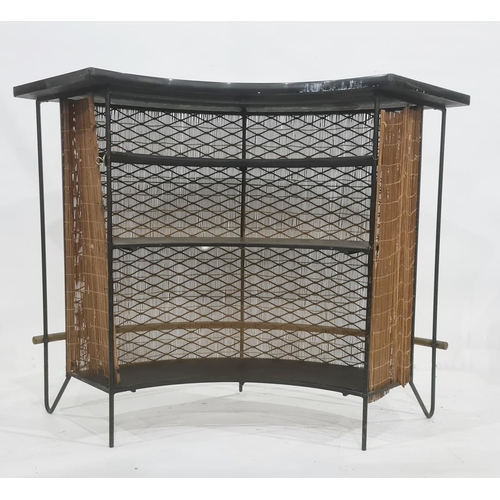 1164 - 20th century bowfront bar with plain black top, with grill front, three shelves and brass tubular fo... 