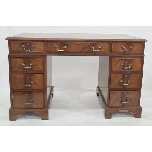 1269 - 20th century mahogany writing desk with green leather inset top and nine assorted drawers, on bracke... 