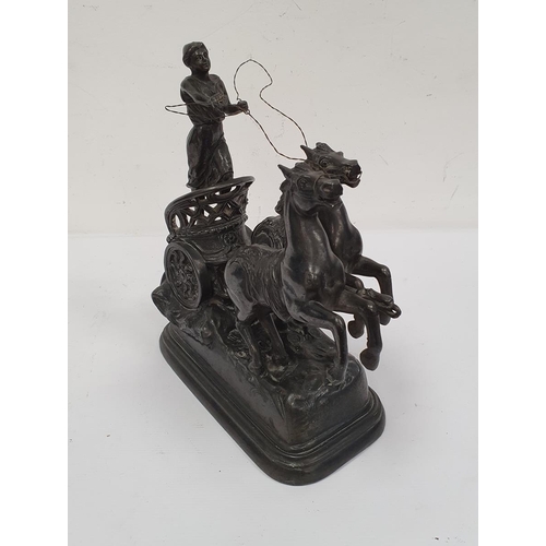 147 - Spelter model of a woman driving a chariot with two rearing horses, 31cm high