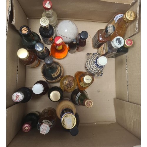 270 - Approximately 140 assorted miniatures of various whiskies, liqueurs, brandies, etc.