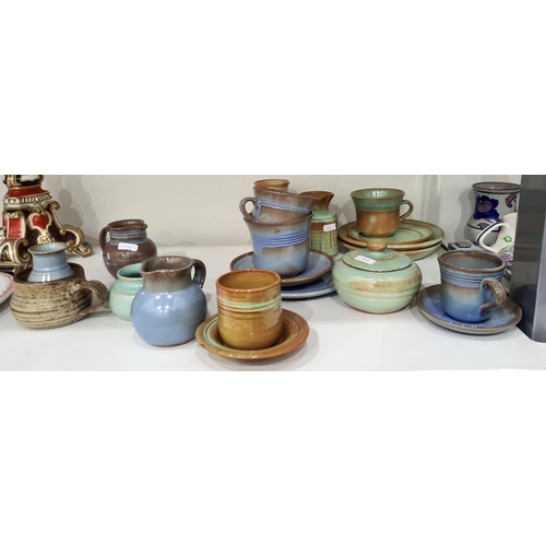 33 - Quantity of Prinknash pottery in blue, green and terracotta coloured glaze, to include teapot, teacu... 