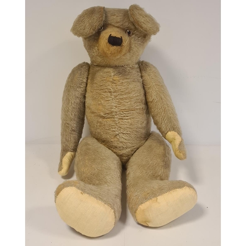 438 - Large mohair stuffed teddy bear with plastic beaded eyes, fabric paws, 69cm long