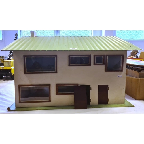 534 - 20th century doll's house with lift-up roof and front opening with green roof and white painted hous... 