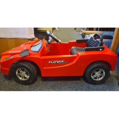 542 - King Roadster child's electric red sports car, 110 cm