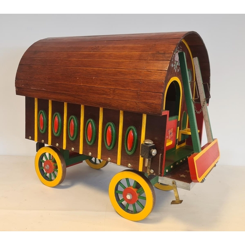 549 - Gypsy caravan, painted with domed roof, door and wheels, 24cm high