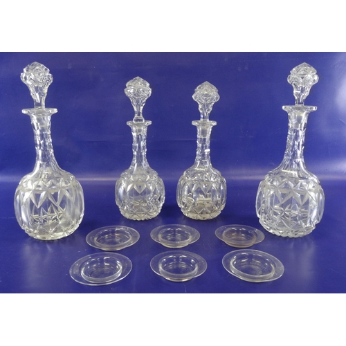 101A - Set of four ( 2 pairs) graduated cut glass wine decanters and a box of miniature glass dishes