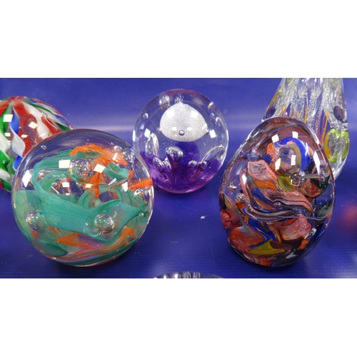 105 - Assorted glass paperweights to include Caithness 'Cauldron', Caithness 'Pebble', Caithness 'Cascadia... 