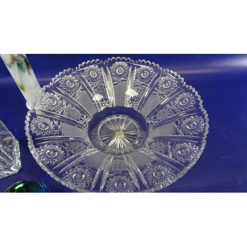 124 - Large cut glass fruit bowl with broad whorl cut everted border, a cut spirit decanter with EPNS moun... 