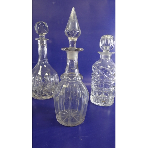 99 - Various glass decanters with stoppers (9)