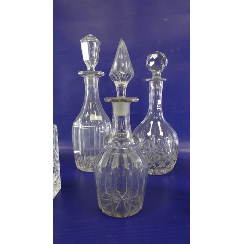 99 - Various glass decanters with stoppers (9)