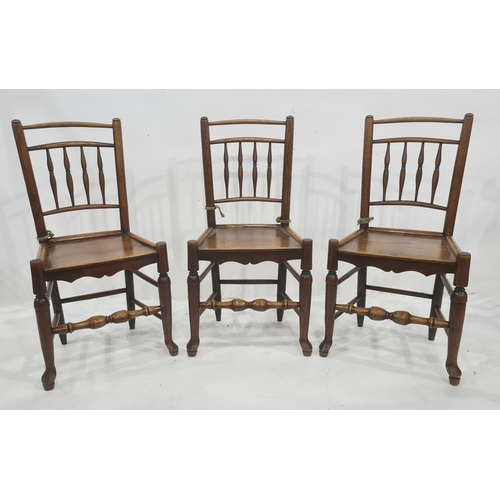 14 - Set of eight country oak and elm railback dining chairs each with quadruple baluster spindles to the... 