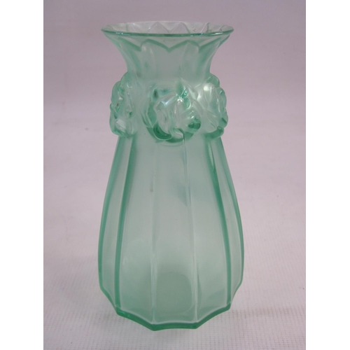 142 - Lalique green satin glass vase, tapered and panelled, embossed rosebuds to the neck, 15cm high